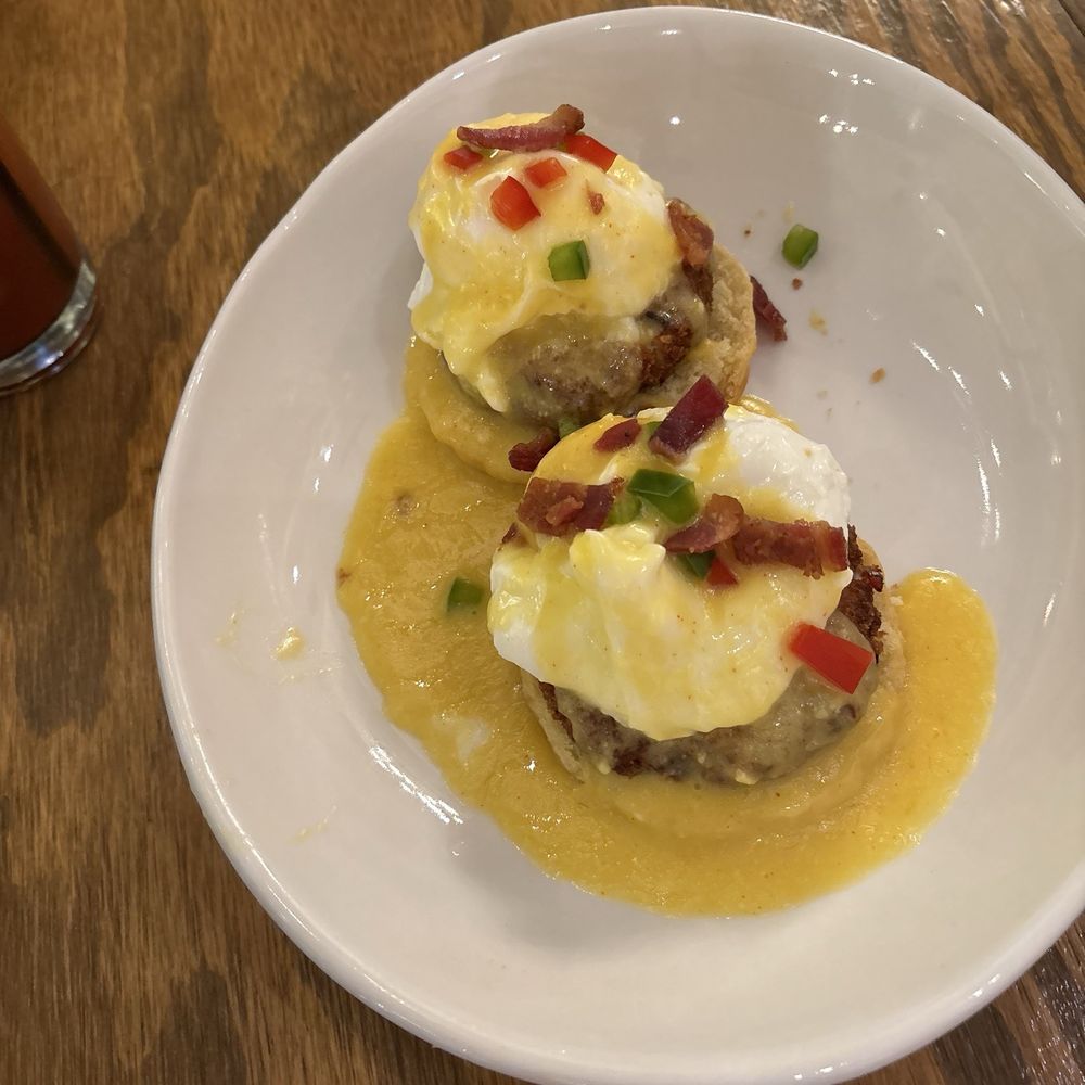 NOLA - Hollandaise sauce covering perfectly cooked poached eggs on top of Crab cakes Yum yum - Cajun/Creole Near Me - LaGrange, Georgia NOLA - Hollandaise sauce covering perfectly cooked poached eggs on top of Crab cakes Yum yum - Cajun/Creole Near Me - LaGrange, Georgia