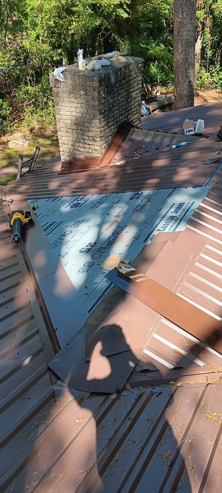 Slide of Taylors Roofing