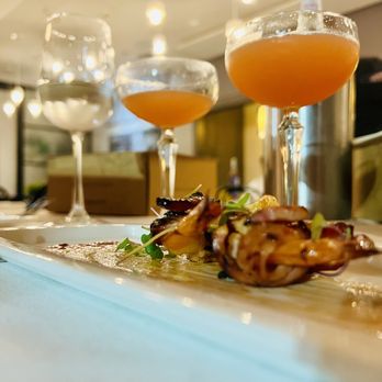 Coop 303 - Paper airplane and bacon wrapped shrimp. - New American Near Me - Atlantic Beach, Florida