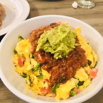 Daily Eats - Tijuana scramble with tater tots underneath. The guacamole on top made it perfect! - New American Near Me - Tampa, Florida Daily Eats - Tijuana scramble with tater tots underneath. The guacamole on top made it perfect! - New American Near Me - Tampa, Florida