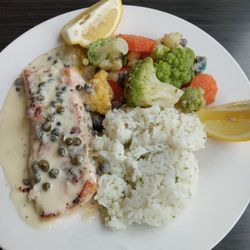 The Community Table - Rosemary Grilled Salmon with capers in cream sauce, tri-color cauliflower and rice. Not bad.