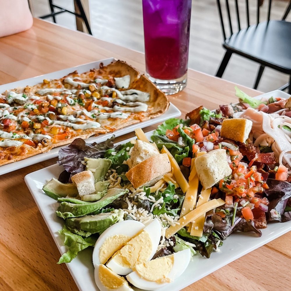 MN Traders - Traders House Salad (front) and Southwest Turkey Flatbread (back) - Coffee & Tea Near Me - Pequot Lakes, Minnesota MN Traders - Traders House Salad (front) and Southwest Turkey Flatbread (back) - Coffee & Tea Near Me - Pequot Lakes, Minnesota