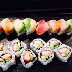 Lucky Sushi & Chinese Restaurant - The top is a rainbow roll and the bottom is a California roll! My basic cravings are met with these two!