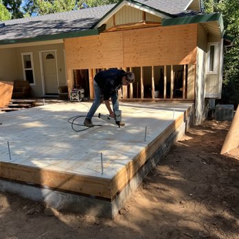 Bumble Bee Construction - a man working on a concrete slab - General Contractors Near Me Bumble Bee Construction - a man working on a concrete slab - General Contractors Near Me