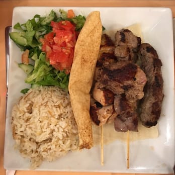 Assanabel - All the delicious grilled meats come wrapped in flatbread with a nice green salad and rice pilaf - Lebanese Near Me - Paris, 75