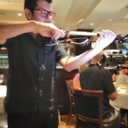 Electric violin player serenading us near the end of the meal. Electric violin player serenading us near the end of the meal.
