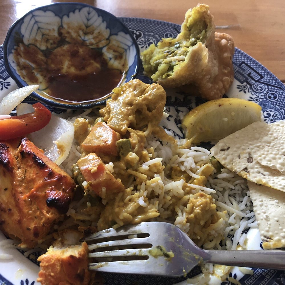 Cumin Restaurant - Partially eaten Coconut Vegetable Dish, Chicken Tikka, Samosa, and papadum with basmati rice. - Indian Near Me - Santa Rosa, California Cumin Restaurant - Partially eaten Coconut Vegetable Dish, Chicken Tikka, Samosa, and papadum with basmati rice. - Indian Near Me - Santa Rosa, California