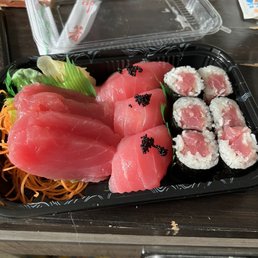 a tray of sushi on a table a tray of sushi on a table