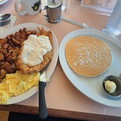 The Sunrise Cafe - Fried chicken hashbrown scrambled eggs pancake. The hashbrowns are wonderful, and the chicken and gravy  receive a 10. Thank you
