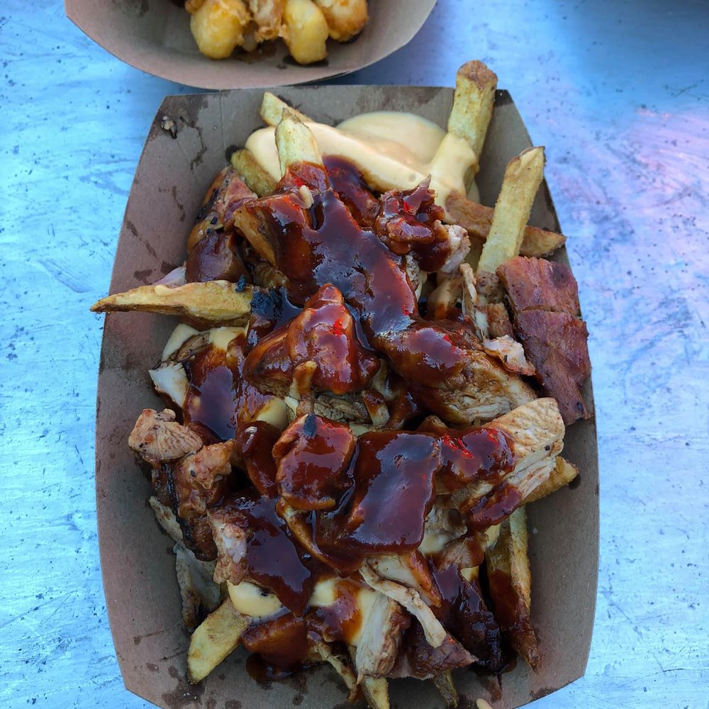 Slo Motion BBQ - a plate of french fries with bbq sauce - Food Trucks Near Me - Sussex, Wisconsin Slo Motion BBQ - a plate of french fries with bbq sauce - Food Trucks Near Me - Sussex, Wisconsin
