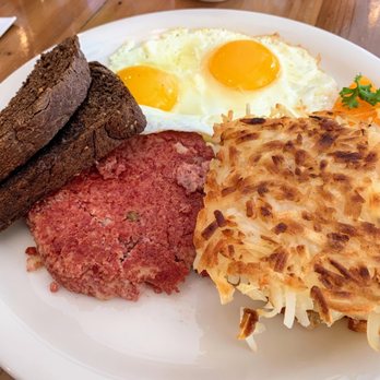 Moke’s Bread And Breakfast - Homemade Corned Beef Hash, Sunny Side Up Eggs, Hash Browns and House Dark Rye Toast - Breakfast & Brunch Near Me - Honolulu, Hawaii