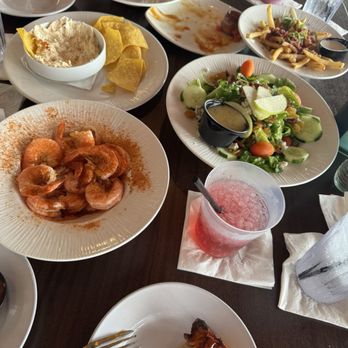 Waterman's Surfside Grille - Crab dip, fried calamari, stuffed fries, salad, boiled shrimp & bacon wrapped scallops - Bars Near Me - Virginia Beach, Virginia Waterman's Surfside Grille - Crab dip, fried calamari, stuffed fries, salad, boiled shrimp & bacon wrapped scallops - Bars Near Me - Virginia Beach, Virginia