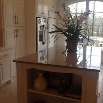 All Natural Stone - a kitchen with a center island - Countertop Installation Near Me - Little Rock, Arkansas