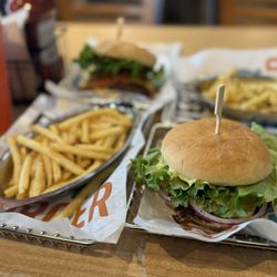 Smashburger - Two classic smash burgers, regular fries, and smasher fries