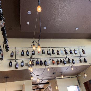 Beards Brewery - Growler collection displayed really well!! - Pubs Near Me - Petoskey, Michigan