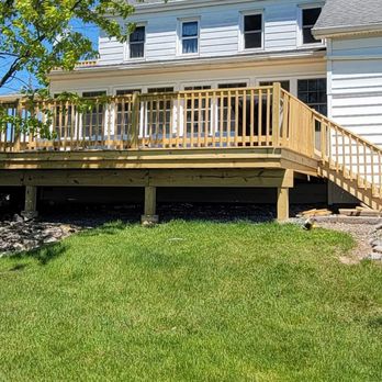 Laughner Contracting Services - a house with a deck - General Contractors Near Me