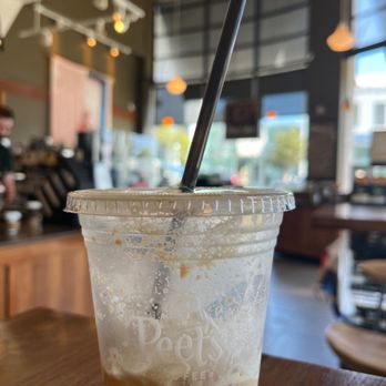 Peet's Coffee - Enjoying an ice latte in the cafe. - Coffee & Tea Near Me - Santa Monica, California Peet's Coffee - Enjoying an ice latte in the cafe. - Coffee & Tea Near Me - Santa Monica, California