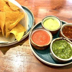 Sea Capitan - Totopos Y Salsa.   I liked the traditional red, my son preferred the avocado based, and my husband preferred the peanut one.