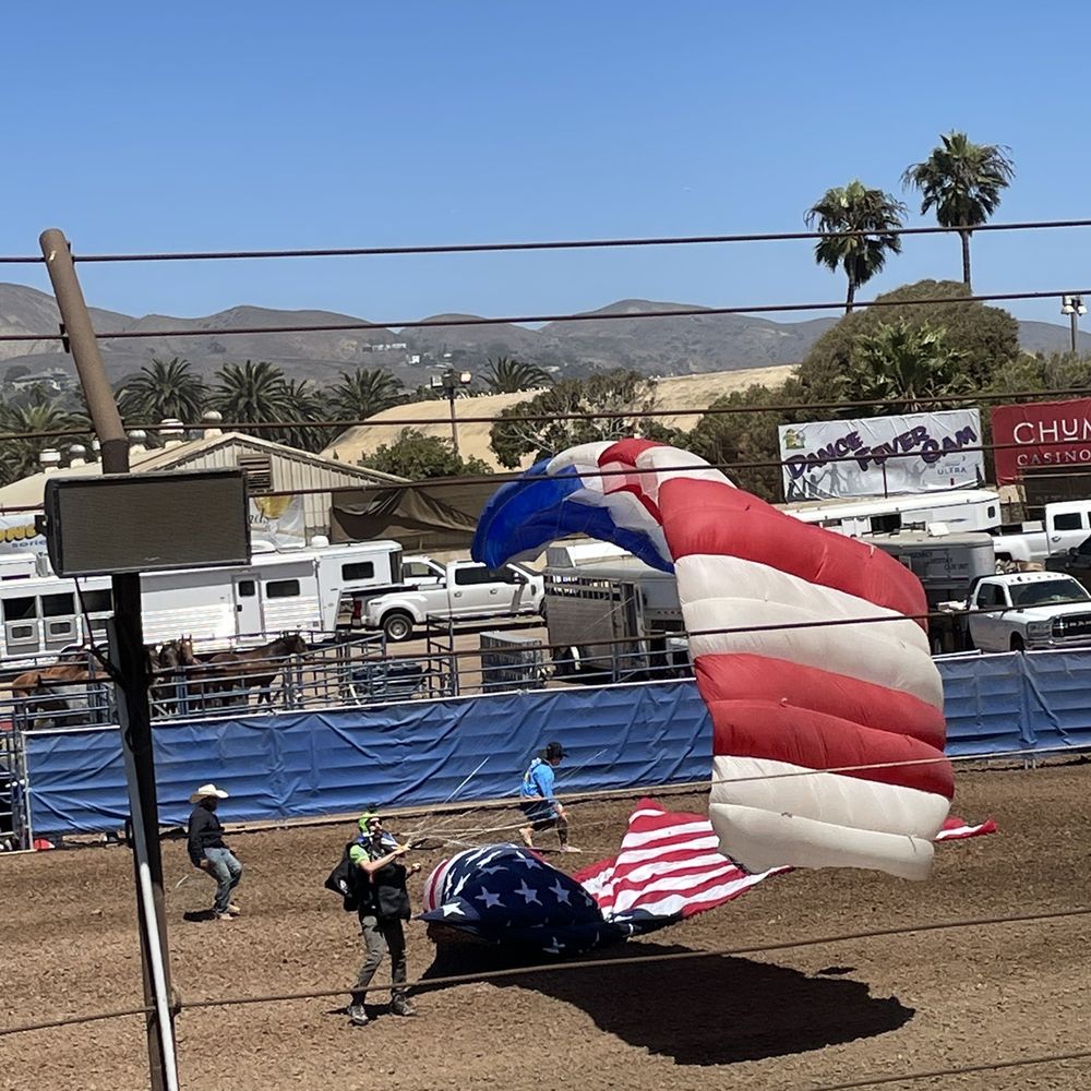 Ventura County Fairgrounds - Flying in by parachute with a huge flag and helpers on the ground. National Anthem Proudly played. - Venues & Event Spaces Near Me - Ventura, California Ventura County Fairgrounds - Flying in by parachute with a huge flag and helpers on the ground. National Anthem Proudly played. - Venues & Event Spaces Near Me - Ventura, California