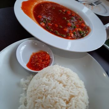 Awang Kitchen - Crab egg foo young with sweet and sour sauce. Like an egg seafood frittata with sauce on top. Tasty. - Indonesian Near Me - Elmhurst, New York
