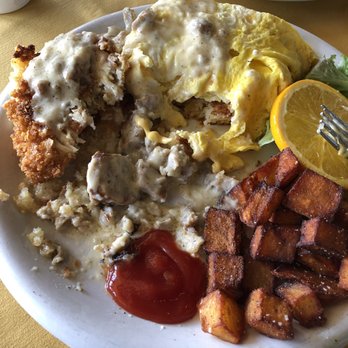 Garden City Cafe - Crunchy chicken biscuit- forgot the pic before I started eating it- so good - American Near Me - Juno Beach, Florida Garden City Cafe - Crunchy chicken biscuit- forgot the pic before I started eating it- so good - American Near Me - Juno Beach, Florida