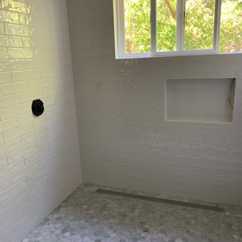 M R Tile Installation - Finished tile! Pony wall removed. Plumber scheduled to complete fixture installation this week and glass door to be installed. - Tiling Near Me