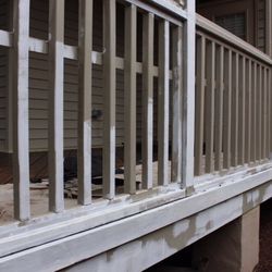Triangle Precision Painting - During: Deck Refinishing. Primed and Painted Trim with Sherwin-Williams Super Paint and Behr Semi-Transparent Stain.