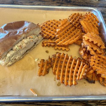The Cookshack - Grilled chicken sandwich with topped with coleslaw and pickles. Super spicy with sweet potato waffle fries - Salad Near Me - Selma, Texas The Cookshack - Grilled chicken sandwich with topped with coleslaw and pickles. Super spicy with sweet potato waffle fries - Salad Near Me - Selma, Texas