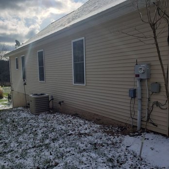 Custom Creations Remodeling - Siding that we did - Damage Restoration Near Me
