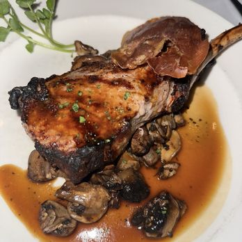 The Capital Grille - Tomahawk Veal Chop with Sage Butter, Marsala Jus and Crispy Prosciutto - Steakhouses Near Me - Boca Raton, Florida