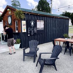 The Lakeside Scoop - Menu and outdoor seating area.