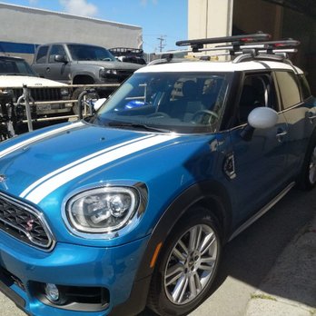 Rack N Road - We love minis! This one has Yakima Timberline baselines along with a supdawg sup/surf carrier up top - Outdoor Gear Near Me - San Rafael, California Rack N Road - We love minis! This one has Yakima Timberline baselines along with a supdawg sup/surf carrier up top - Outdoor Gear Near Me - San Rafael, California