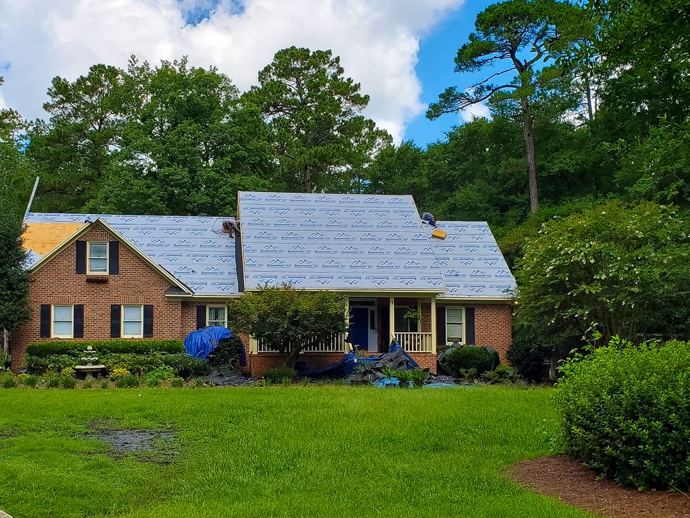 Slide of Total Roofing Solutions & Construction