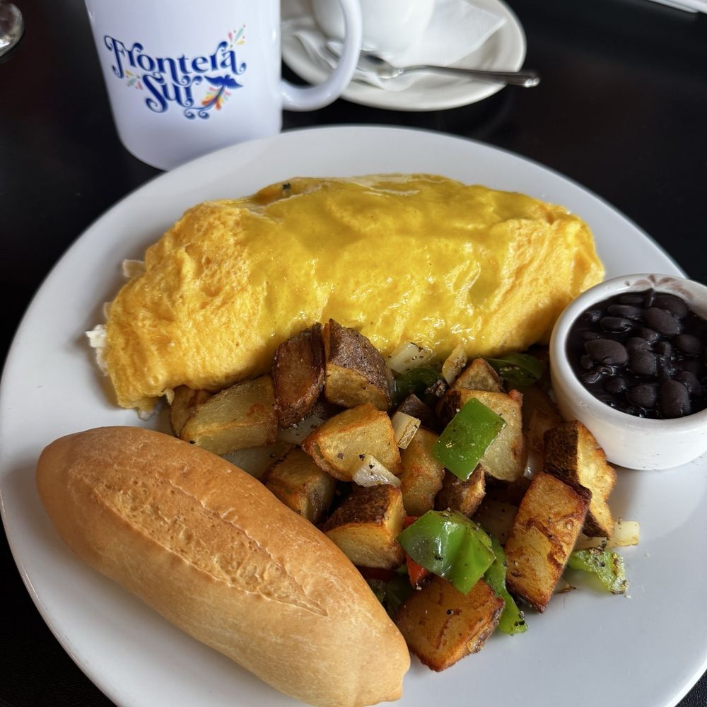 Pork Chile Verde Omelette with roasted potatoes. Pork Chile Verde Omelette with roasted potatoes.