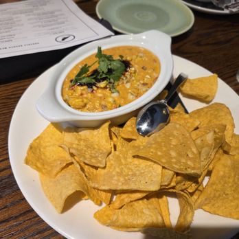 Grackle - Elote Dip with Macha and housemade tortilla chips - Cocktail Bars Near Me - Maple Grove, Minnesota Grackle - Elote Dip with Macha and housemade tortilla chips - Cocktail Bars Near Me - Maple Grove, Minnesota