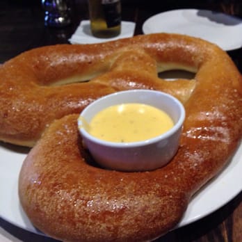 Williston Brewing Company - Seriously huge homemade pretzel, DH guesses it's 14x16. We devoured it! Awesome sauce too! - Steakhouses Near Me - Williston, North Dakota Williston Brewing Company - Seriously huge homemade pretzel, DH guesses it's 14x16. We devoured it! Awesome sauce too! - Steakhouses Near Me - Williston, North Dakota