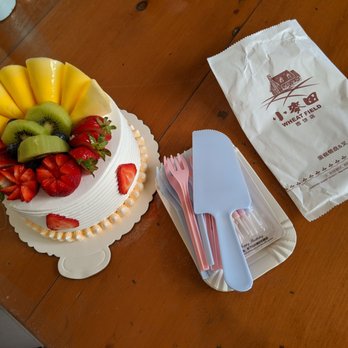 Fancy Wheatfield Bakery - Small fruit cake, comes with 8 candles, plates, fork, and knife - Bakeries Near Me - San Francisco, California