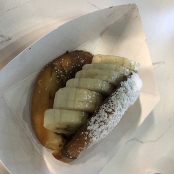 King Bao - Tarzan Bao - fried Bao, banana, Nutella and powdered sugar - Asian Fusion Near Me - Orlando, Florida King Bao - Tarzan Bao - fried Bao, banana, Nutella and powdered sugar - Asian Fusion Near Me - Orlando, Florida