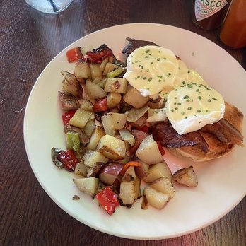 Wilma & Frieda's Cafe - Eggs Benedict with Bacon and breakfast potatoes. - Comfort Food Near Me - Palm Desert, California Wilma & Frieda's Cafe - Eggs Benedict with Bacon and breakfast potatoes. - Comfort Food Near Me - Palm Desert, California