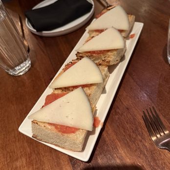 Anima by Edo - Manchego cheese and tomato bread - Tapas/Small Plates Near Me - Las Vegas, Nevada Anima by Edo - Manchego cheese and tomato bread - Tapas/Small Plates Near Me - Las Vegas, Nevada