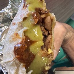 Red and green sauce on my super burrito
