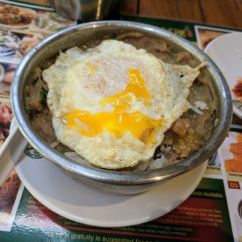 Tim Ho Wan - Steamed rice with minced beef and pan fried egg, yolk running - Dim Sum Near Me - Honolulu, Hawaii Tim Ho Wan - Steamed rice with minced beef and pan fried egg, yolk running - Dim Sum Near Me - Honolulu, Hawaii