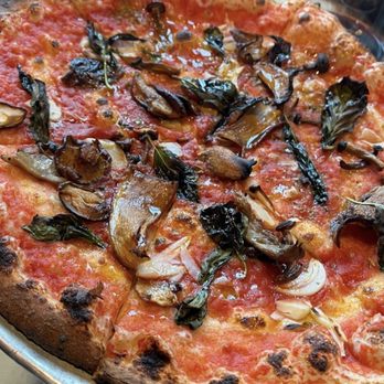 Fortina - Marinara pie with mushrooms added - Italian Near Me - Armonk, New York Fortina - Marinara pie with mushrooms added - Italian Near Me - Armonk, New York