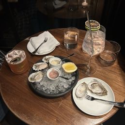 Half dozen hama hama oysters, angel's tonic, bartender's choice cocktail Half dozen hama hama oysters, angel's tonic, bartender's choice cocktail