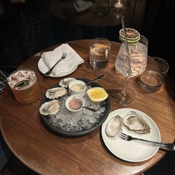 Deep Dive - Half dozen hama hama oysters, angel's tonic, bartender's choice cocktail - Speakeasies Near Me - Seattle, Washington Deep Dive - Half dozen hama hama oysters, angel's tonic, bartender's choice cocktail - Speakeasies Near Me - Seattle, Washington
