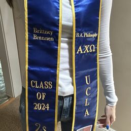 Embroidery work on graduation sash Embroidery work on graduation sash