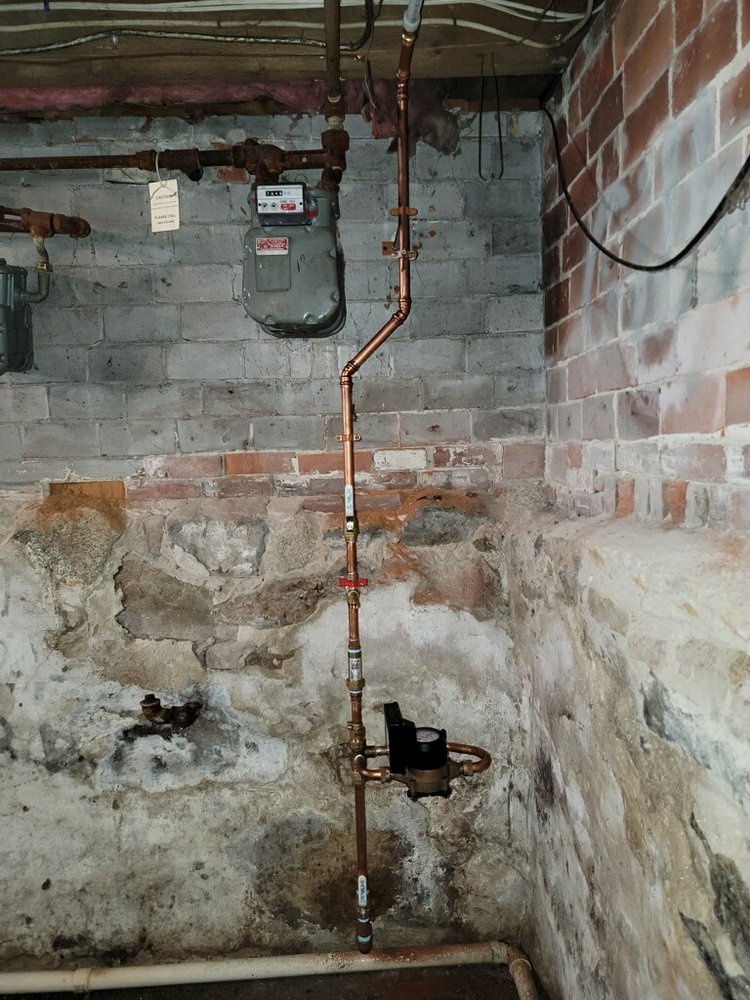 Slide of AT Plumbing Services