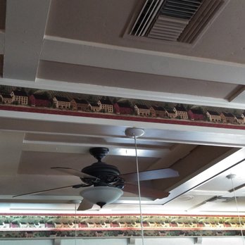 Country Waffles - Just like a tacky motel that hasn't been updated, there are those strips of wallpaper up in the ceiling. Too funny. - Waffles Near Me - Citrus Heights, California