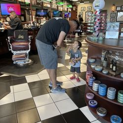 V's Barbershop Vegas Mountain's Edge - So many products to choose from... my husband got the glossy hair product per Manny's recommendation.