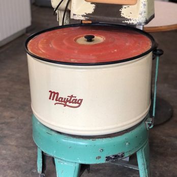 Mood Cafe - an old machine with a red and white logo - Cafes Near Me - Edmonton, Alberta